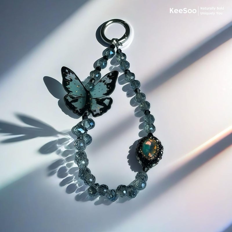 KEESOO Store سحر الفراشة الزرقاء تصميم أصلي لحلية الهاتف مع 2 علامة ربط - أنيقة، متينة، وسلسلة هاتف بدون استخدام اليدين - متوافقة مع آيفون، سامسونج، بيكسل والمزيد - Image 2